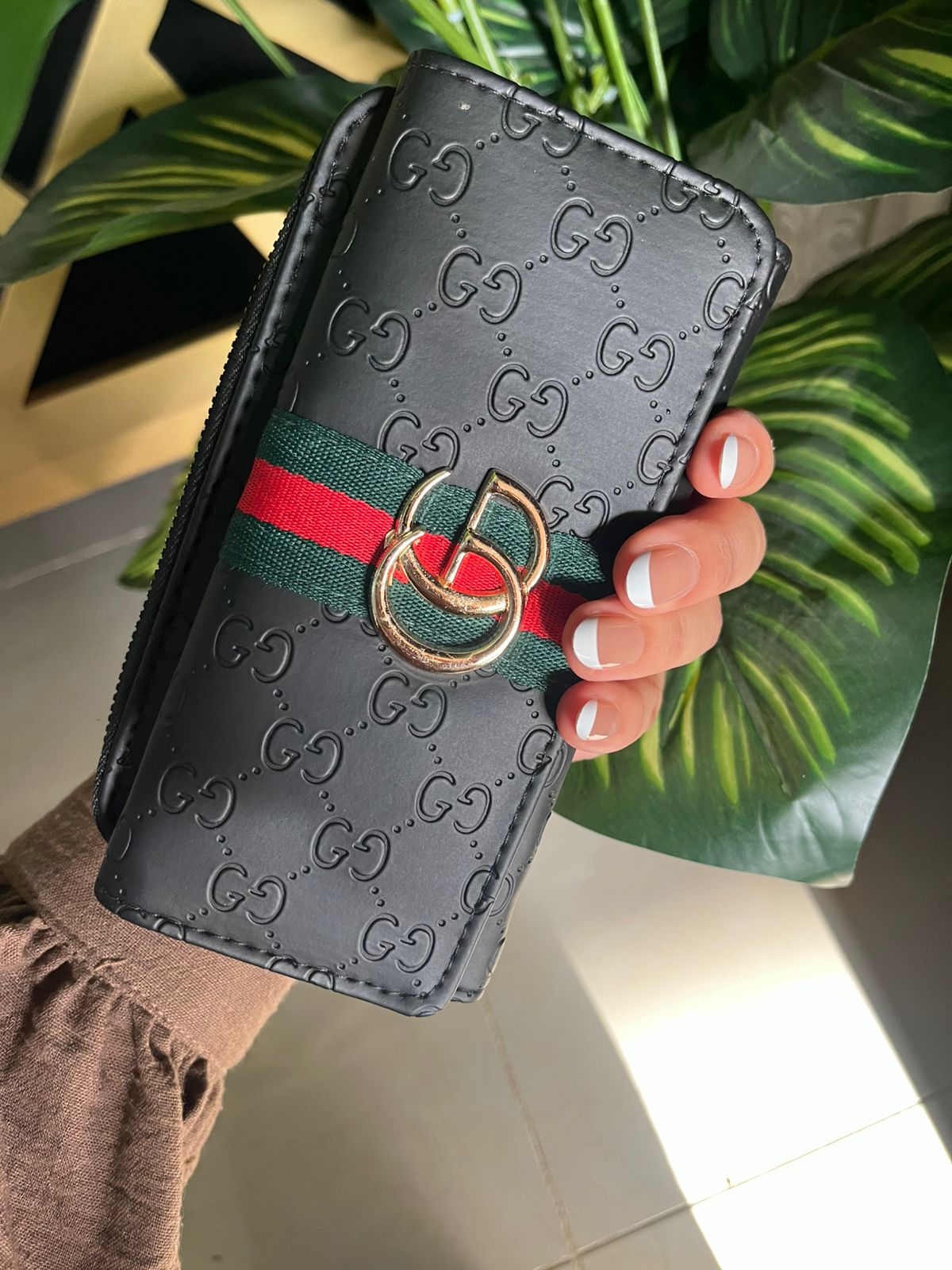 محفظه قوتشي (Gucci)،